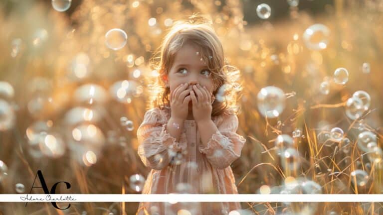 toddler and bubbles in a field